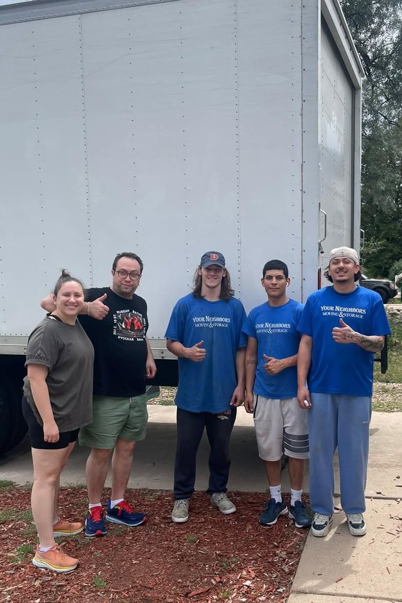 Customers with the Your Neighbors moving crew